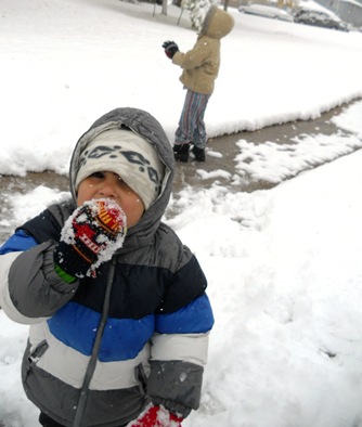 Samuel eating snow