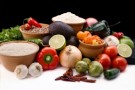 Fresh ingrediants for salsa, rice. beans and tortillas